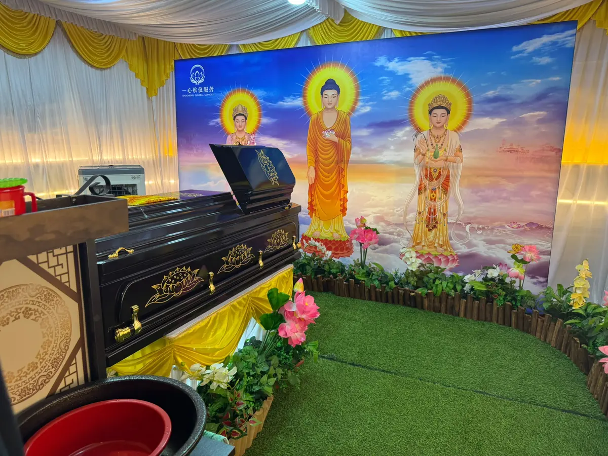 Buddhist funeral casket and memorial altar setup