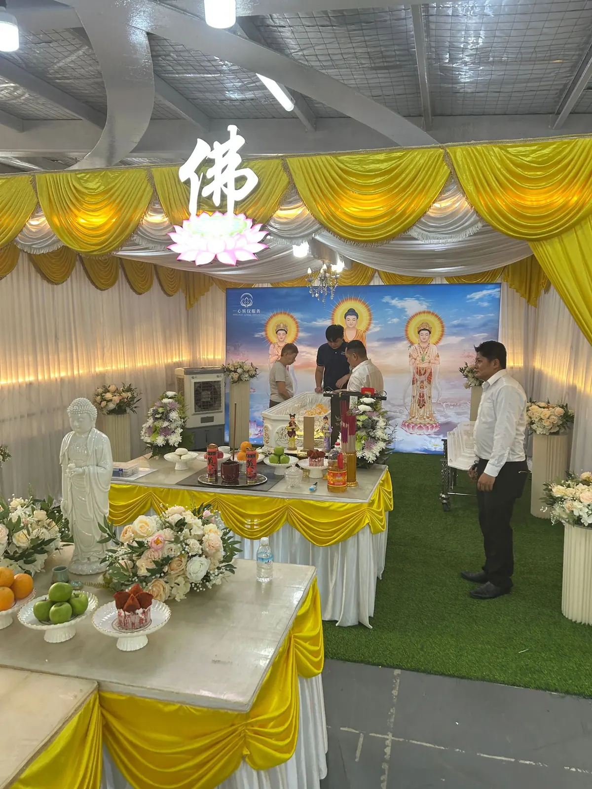 Family during the final viewing before casket closing